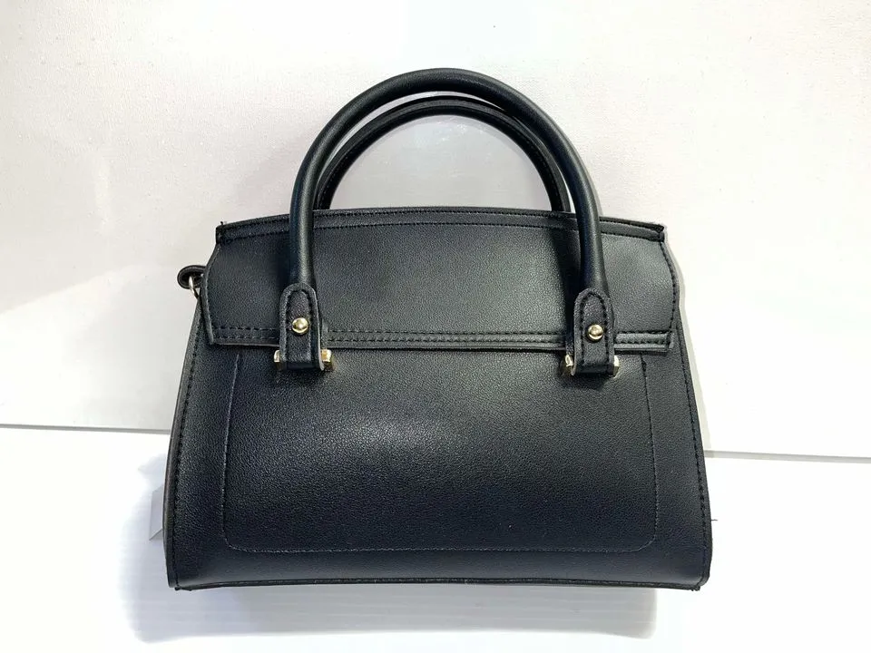 Black hand purse with gold clasp